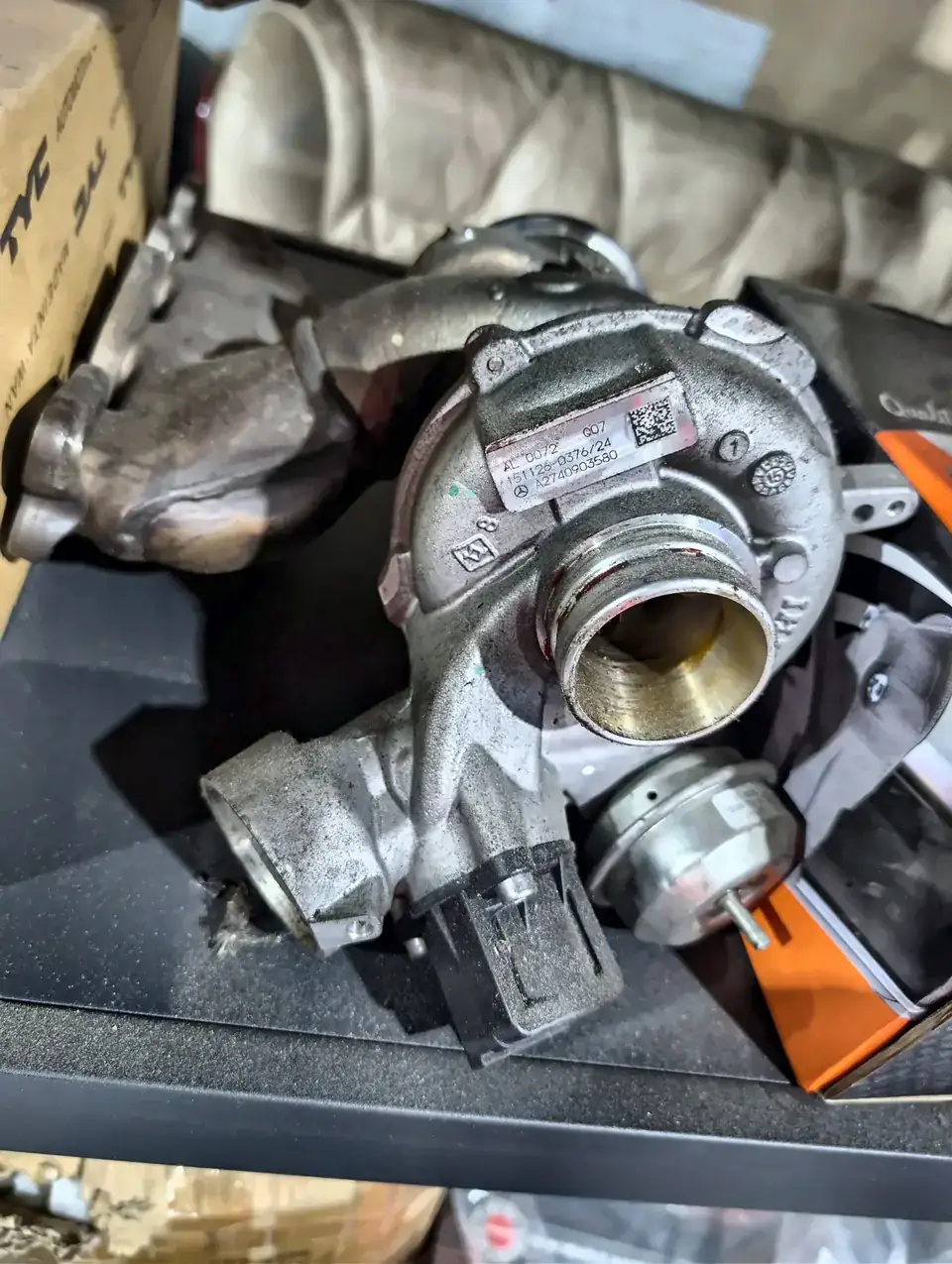 Diesel turbocharger removed for inspection
